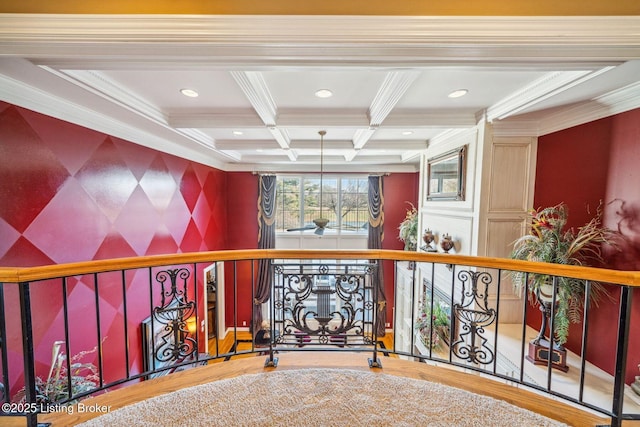 hallway with coffered ceiling, ornamental molding, wood finished floors, beamed ceiling, and recessed lighting