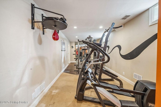 exercise room featuring baseboards, visible vents, and recessed lighting