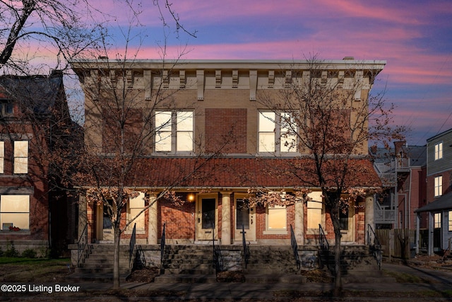 view of front of property with brick siding