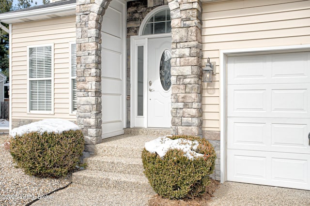 view of exterior entry featuring stone siding