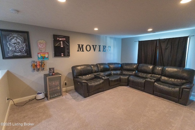 carpeted living room with visible vents, baseboards, and recessed lighting