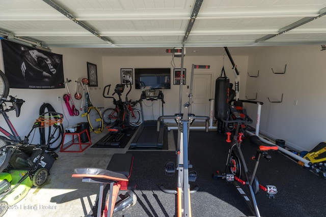 exercise room featuring a garage