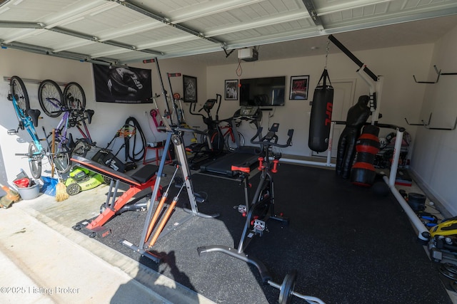 workout area with a garage