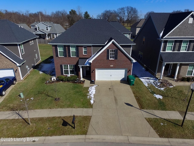 view of front of home featuring a garage, a front yard, concrete driveway, and brick siding