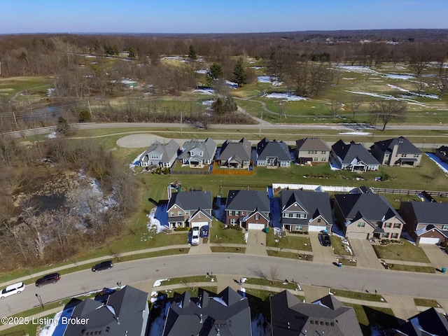 birds eye view of property with a residential view