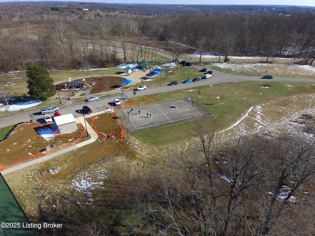 birds eye view of property with a forest view