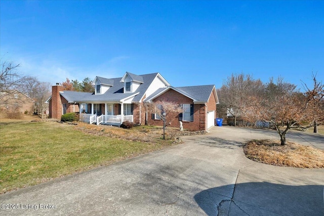 cape cod home featuring driveway, a porch, a front yard, and brick siding