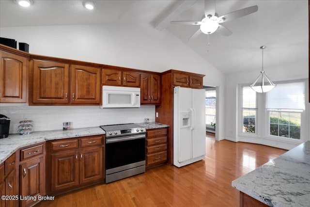 kitchen with light stone countertops, white appliances, light wood-style floors, decorative backsplash, and beamed ceiling