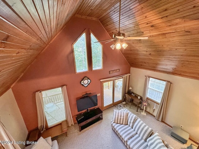 interior space with high vaulted ceiling, wood ceiling, carpet flooring, and ceiling fan