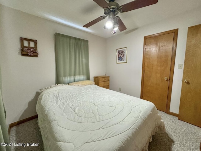 bedroom with carpet, baseboards, and ceiling fan