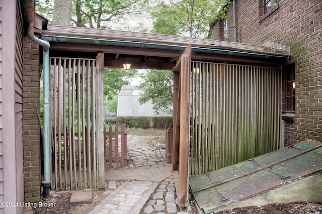 exterior space featuring brick siding