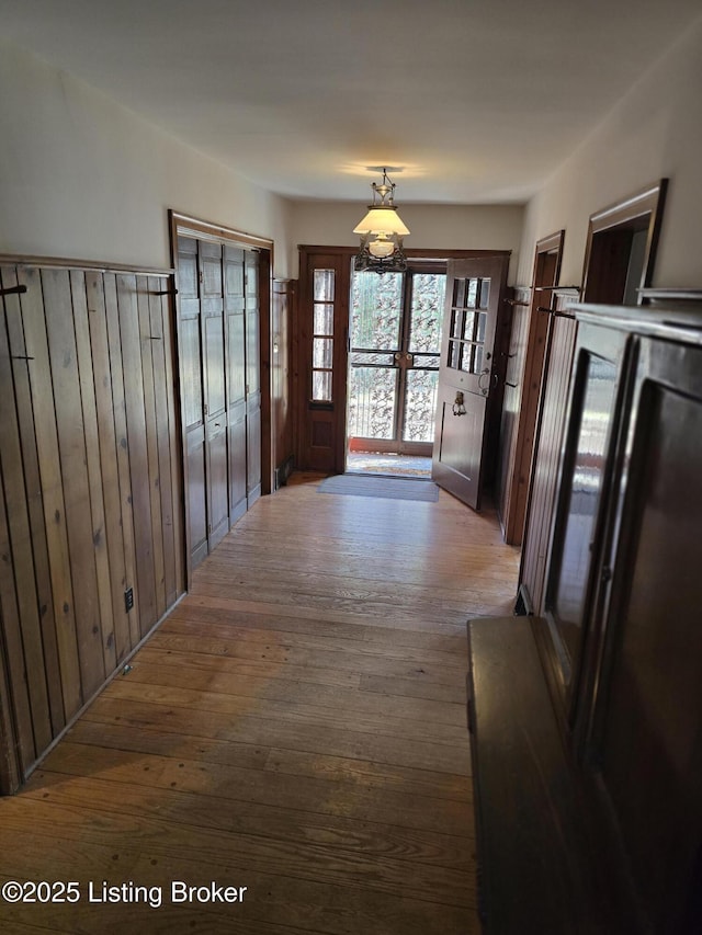 doorway featuring wood-type flooring