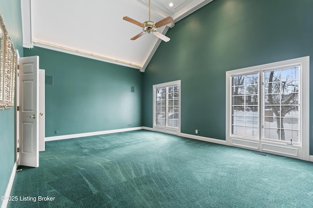 empty room featuring visible vents, baseboards, carpet floors, high vaulted ceiling, and a ceiling fan