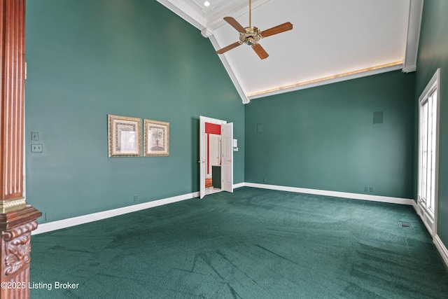 empty room featuring high vaulted ceiling, dark carpet, a ceiling fan, and baseboards