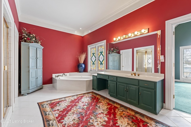 bathroom featuring vanity, a bath, ornamental molding, and tile patterned flooring