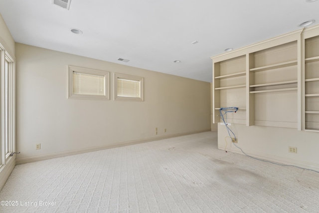 unfurnished bedroom with visible vents, baseboards, and carpet flooring