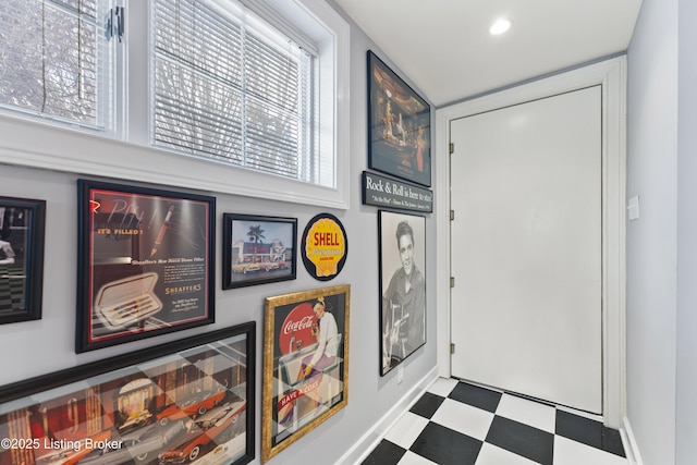 doorway to outside featuring tile patterned floors and recessed lighting