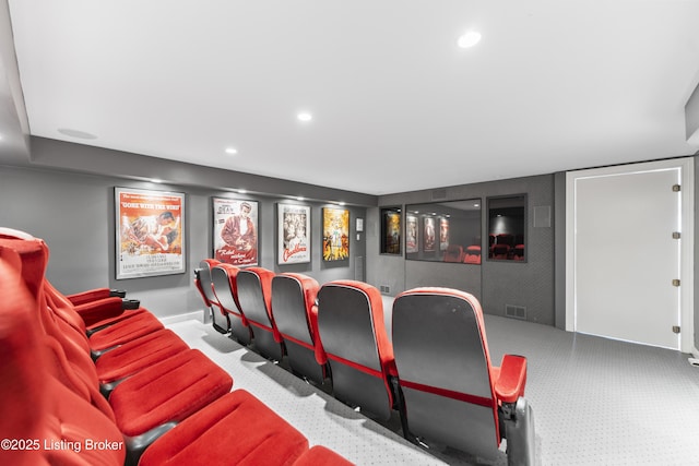 cinema room with recessed lighting, visible vents, and carpet floors