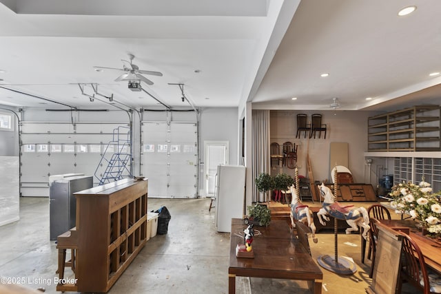 garage featuring recessed lighting, a ceiling fan, and a garage door opener