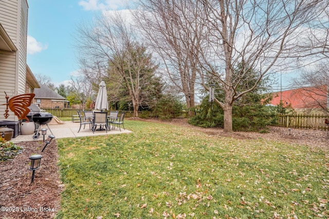 view of yard with a patio area and fence