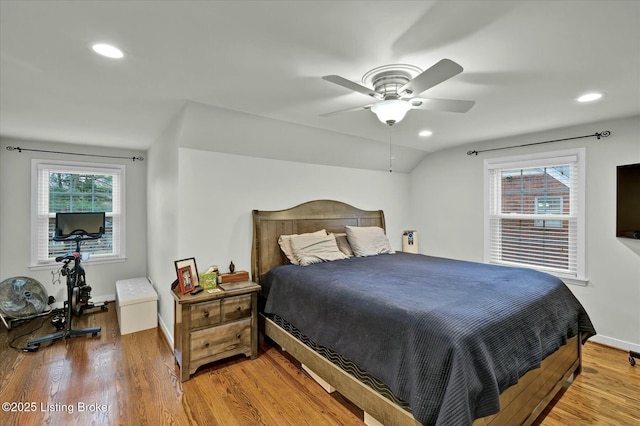 bedroom with lofted ceiling, recessed lighting, a ceiling fan, baseboards, and light wood finished floors