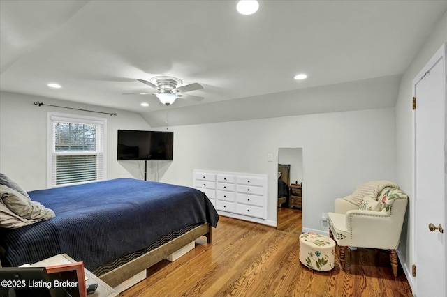 bedroom featuring lofted ceiling, ceiling fan, wood finished floors, and recessed lighting