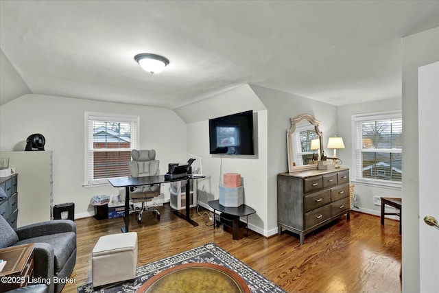 office area with lofted ceiling, dark wood-style flooring, a wealth of natural light, and baseboards