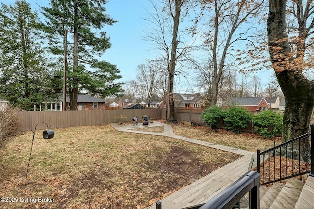 view of yard featuring a fenced backyard and a patio