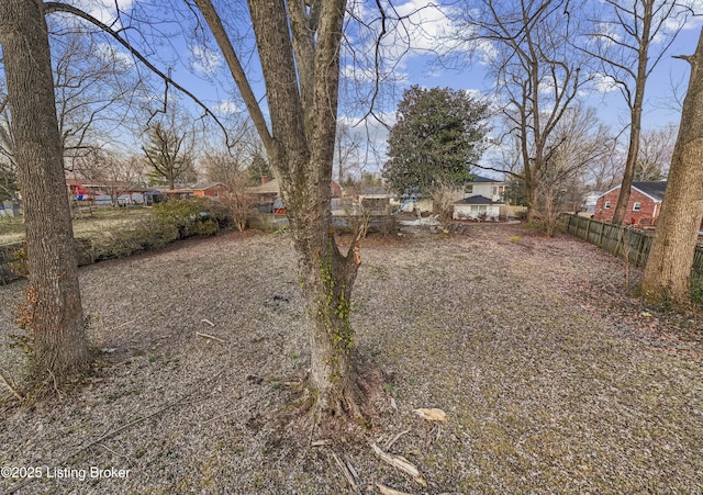 view of yard featuring fence