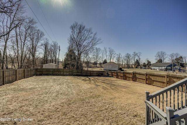 view of yard with a fenced backyard