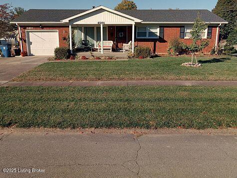 ranch-style house featuring driveway, an attached garage, covered porch, a front lawn, and brick siding