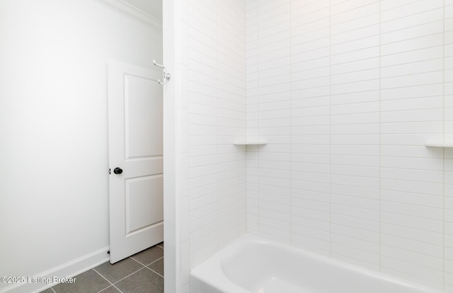 full bath with shower / bathing tub combination, ornamental molding, tile patterned flooring, and baseboards