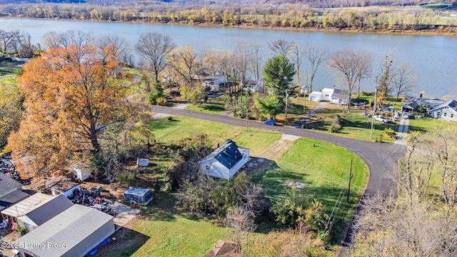 drone / aerial view with a residential view and a water view