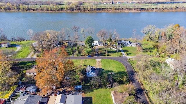 drone / aerial view featuring a water view and a residential view
