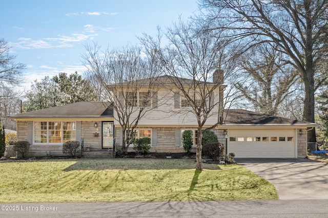 tri-level home featuring driveway, stone siding, a chimney, an attached garage, and a front yard