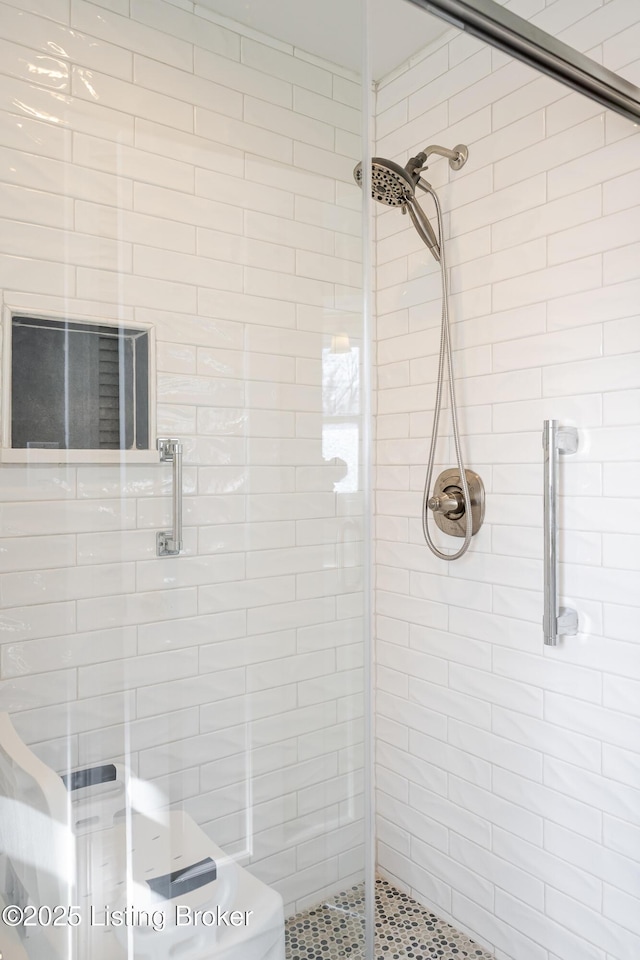 bathroom featuring a stall shower