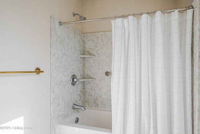 bathroom featuring shower / bathtub combination with curtain