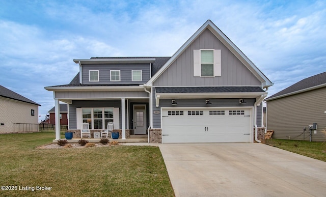 craftsman-style home featuring a front lawn, a porch, roof with shingles, a garage, and driveway