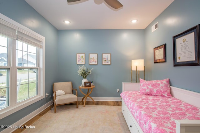 bedroom with recessed lighting, visible vents, baseboards, and light wood finished floors