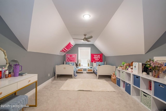 bedroom with baseboards, ceiling fan, carpet flooring, and vaulted ceiling