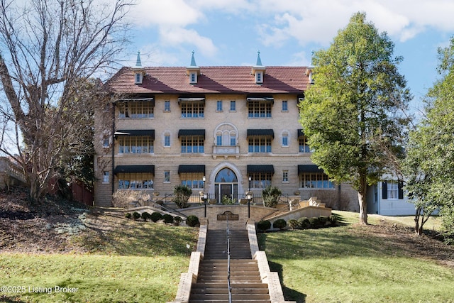 view of building exterior featuring stairway