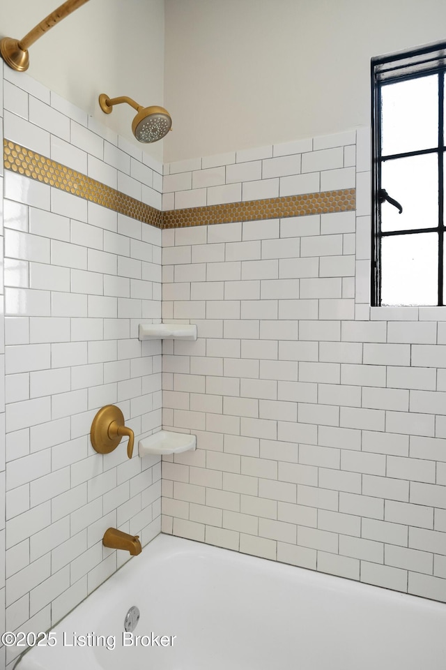 bathroom with shower / washtub combination