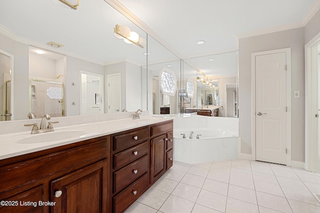 bathroom featuring tile patterned flooring, crown molding, a sink, and a shower stall