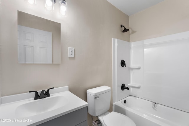 bathroom featuring vanity, toilet, and shower / bath combination