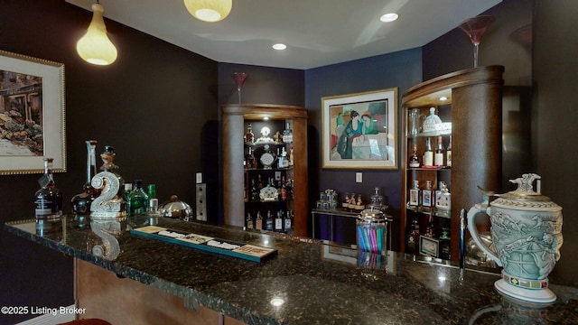 bar featuring recessed lighting and a bar