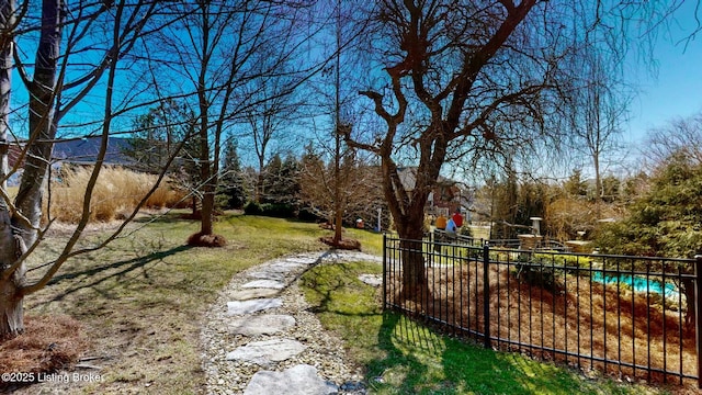 view of yard with fence