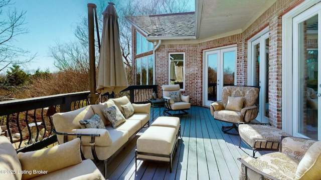 deck with an outdoor hangout area