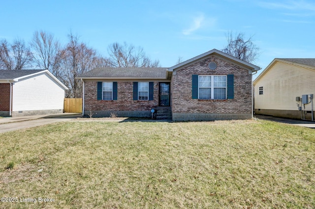 ranch-style house with brick siding, a front yard, and fence