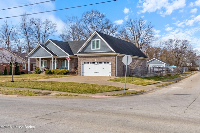 view of front of home with a garage, brick siding, fence, concrete driveway, and a front yard