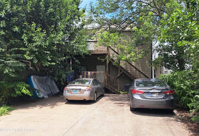 view of front of property with stairs